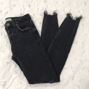 Denim pants frayed bottoms